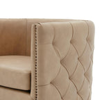 Fauteuil pivotant capitonné en cuir pleine fleur Leslie
